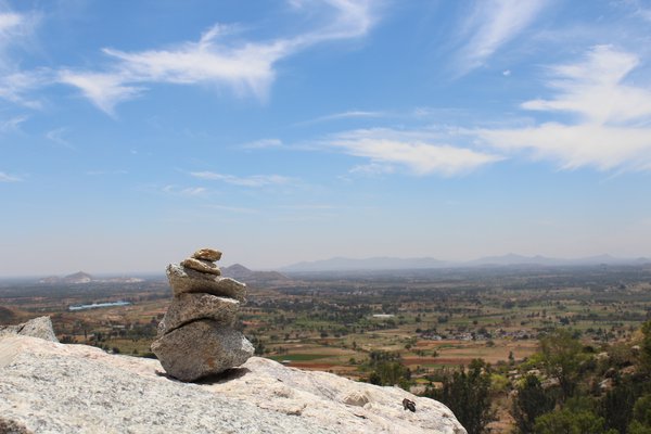 An image of piled stones on a hill