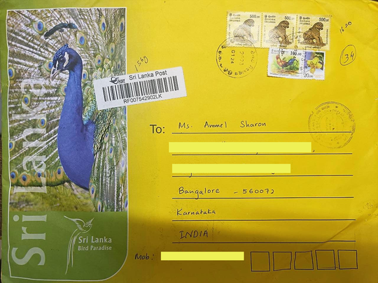 Image of envelope with peacock